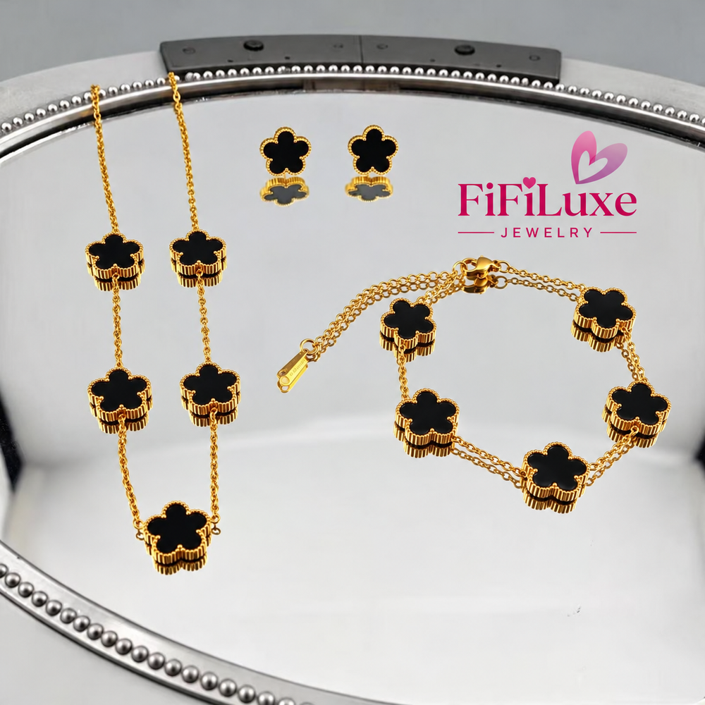 Fleur Set black clover necklace, bracelet and earrings with FiFiLuxe pink logo