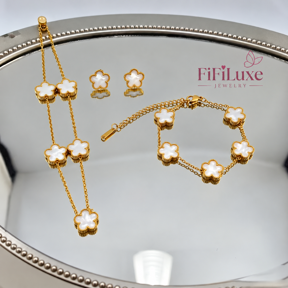Fleur Set white clover necklace, bracelet and earrings with FiFiLuxe Jewelry logo
