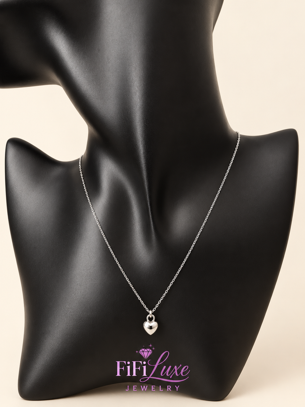 variant: Silver | Apple Belle Necklace, silver heart pendant on black display