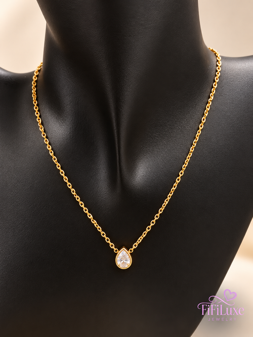 Solenne Teardrop Necklace on black display bust, FiFiLuxe Jewelry